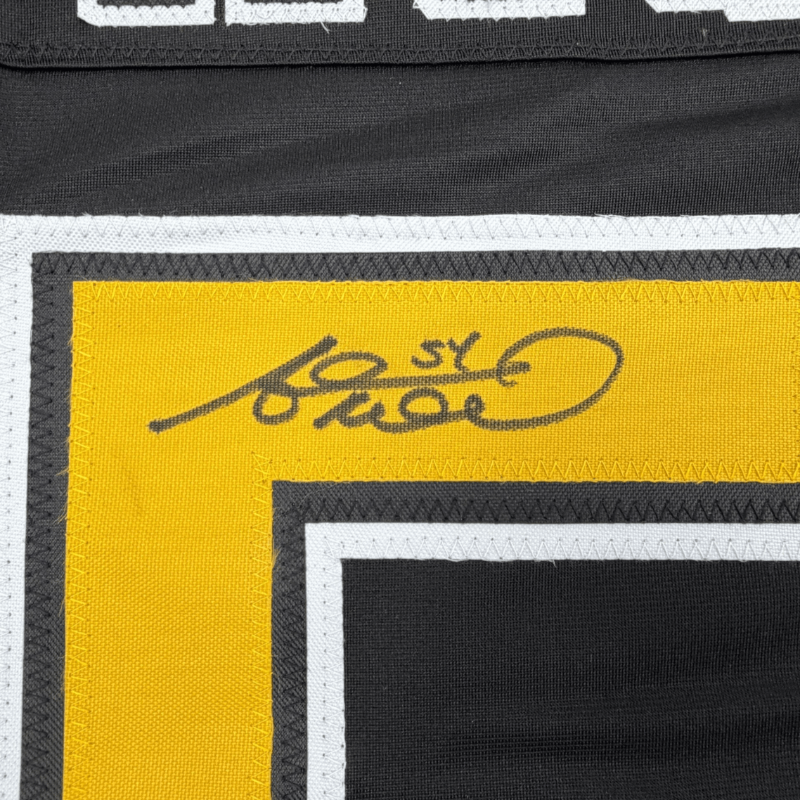 Framed Autographed/Signed Adam McQuaid 35x39 Boston Black Hockey Jersey JSA COA
