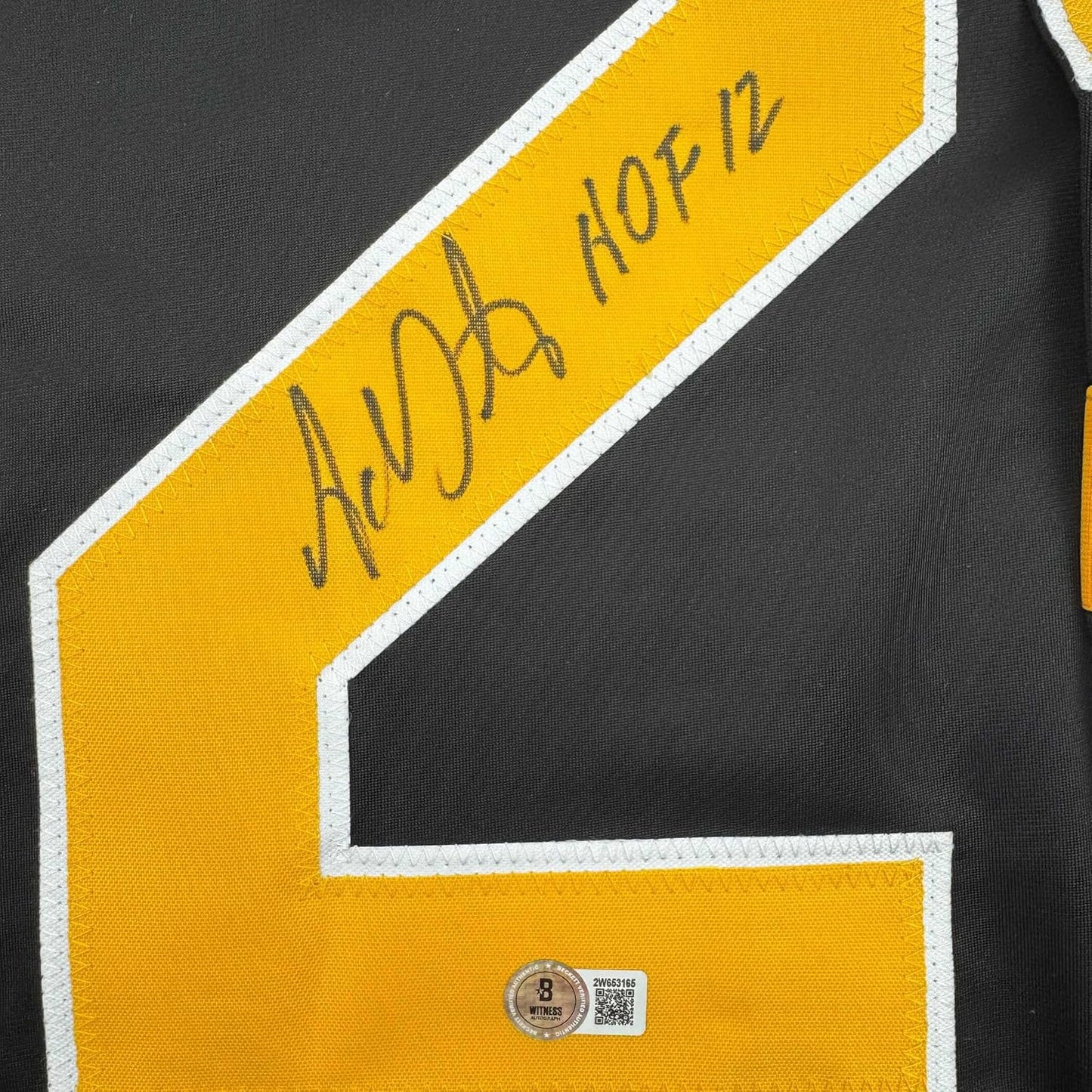 Framed Autographed/Signed Adam Oates 35x39 "HOF 12" Boston Black Hockey Jersey Beckett BAS COA