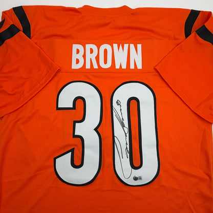 Autographed/Signed Chase Brown Cincinnati Orange Football Jersey Beckett BAS COA