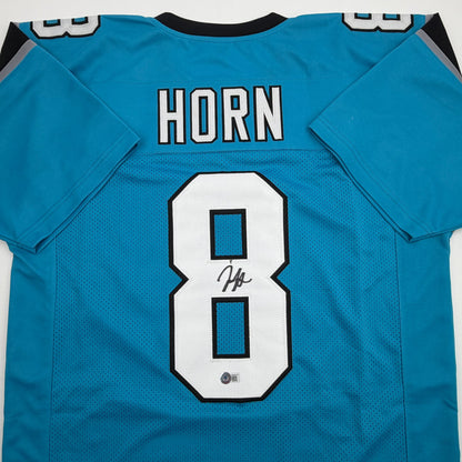 Autographed/Signed Jaycee Horn Carolina Blue Football Jersey Beckett BAS COA