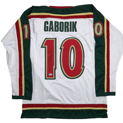 Autographed/Signed Marian Gaborik Minnesota White 25th Anniversary Hockey Jersey Beckett BAS COA