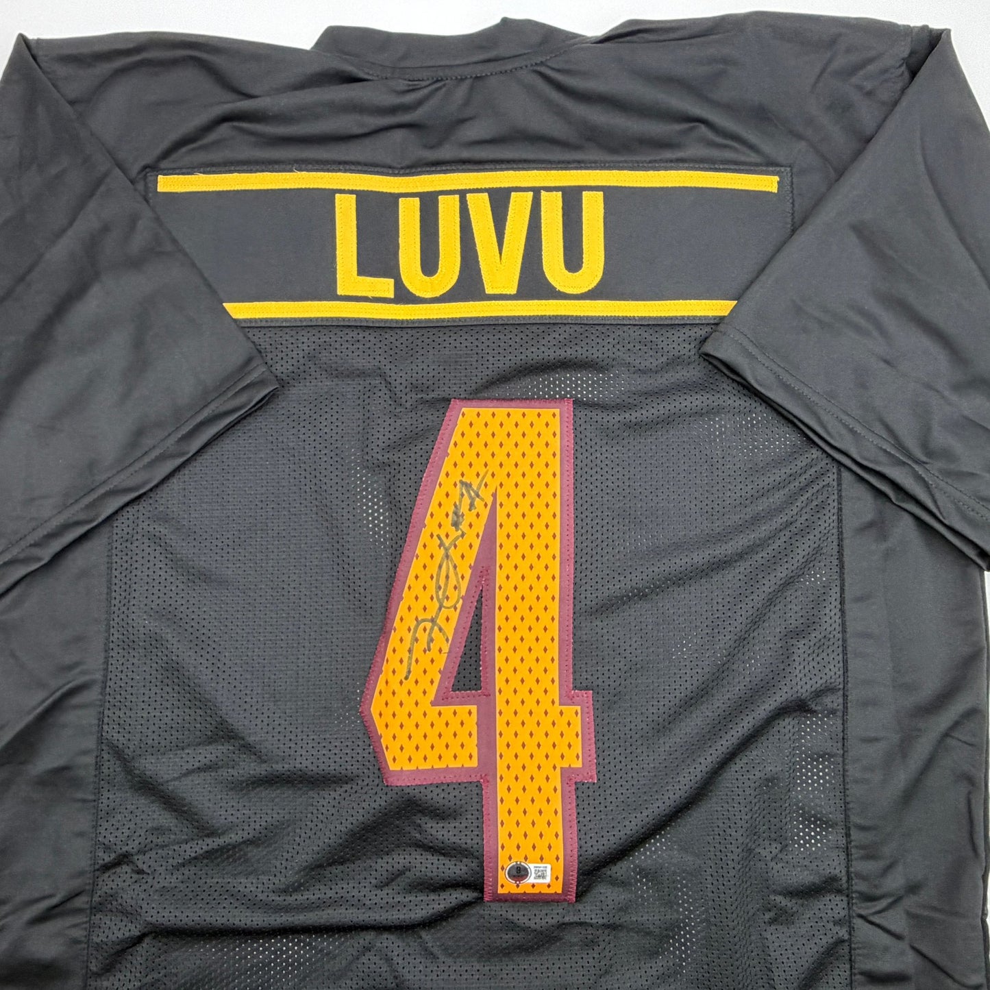 Autographed/Signed Frankie Luvu Washington Black Football Jersey Beckett BAS COA