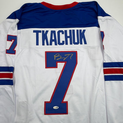 Autographed/Signed Brady Tkachuk USA United States 2026 Olympics Gold Medal White Hockey Jersey JSA COA