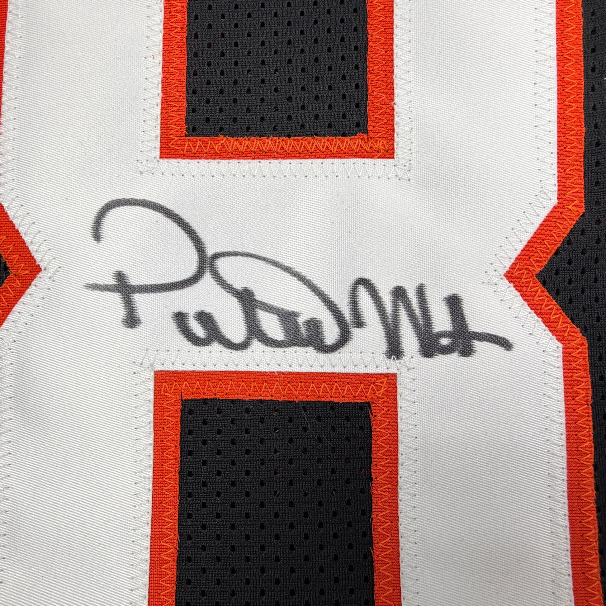 Autographed/Signed Peter Warrick Cincinnati Black Football Jersey Beckett BAS COA
