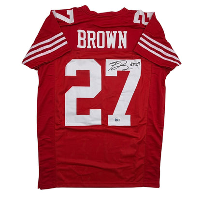 Autographed/Signed Ji'Ayir Brown San Francisco Red Football Jersey Beckett BAS COA