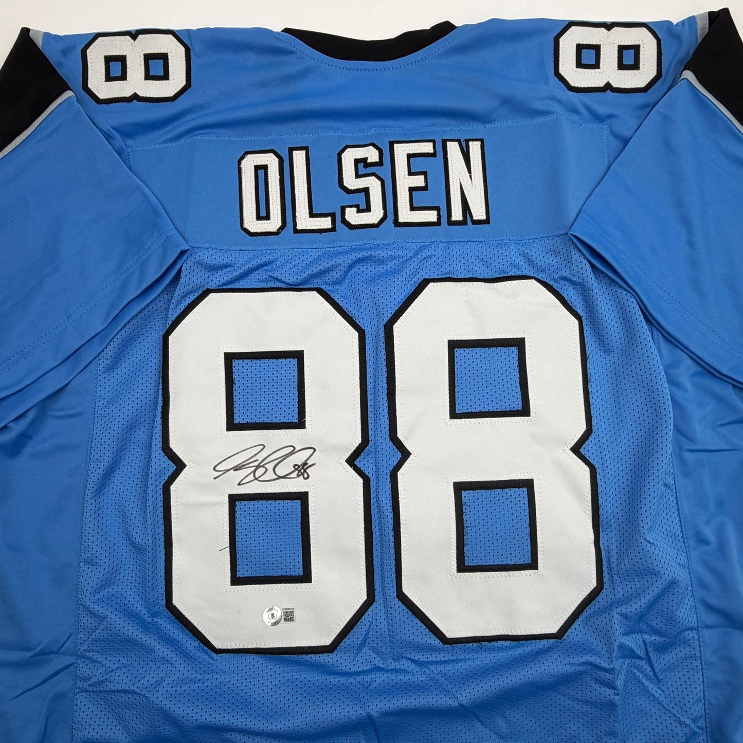 Autographed/Signed Greg Olsen Carolina Blue Football Jersey Beckett BAS COA