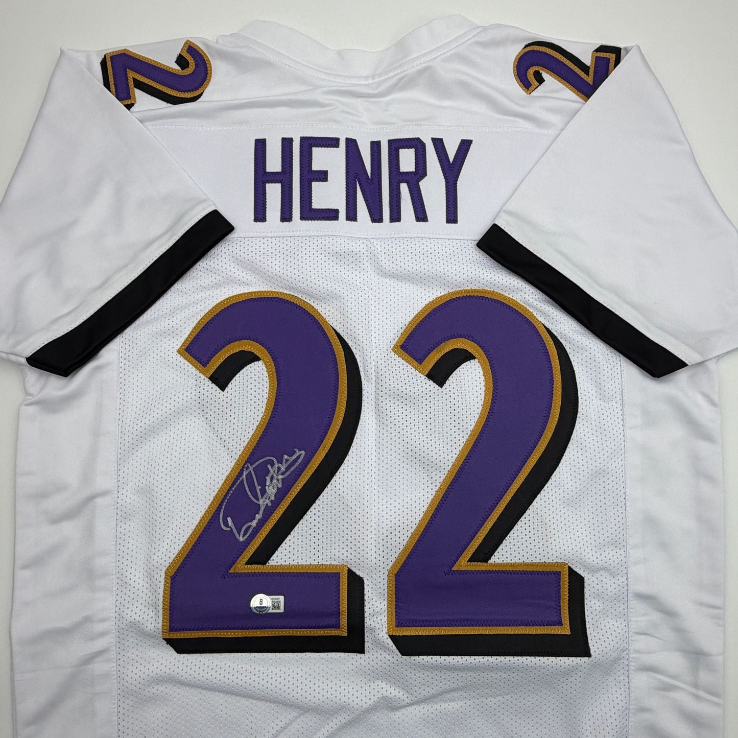 Autographed/Signed Derrick Henry Baltimore White Football Jersey Beckett BAS COA