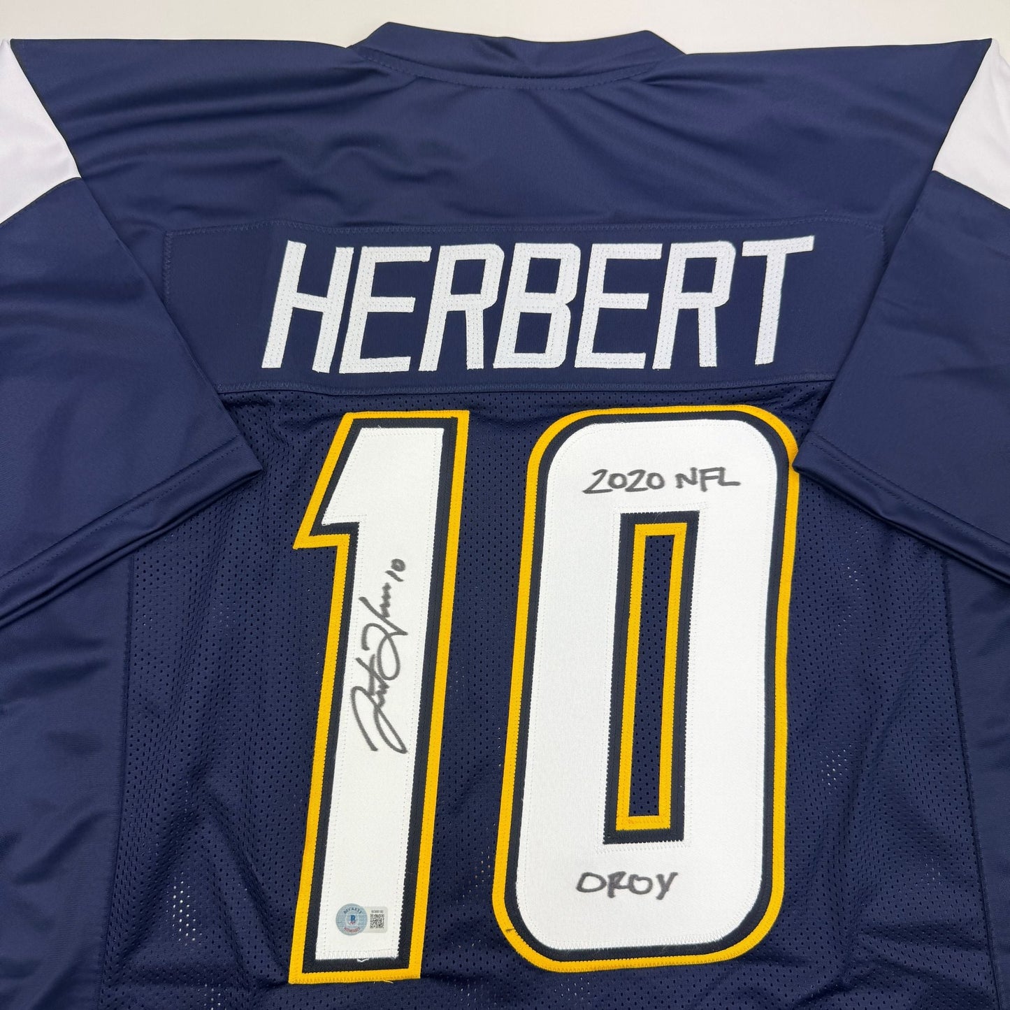 Autographed/Signed Justin Herbert 2020 ROY Los Angeles San Diego Navy Blue Football Jersey Beckett BAS COA