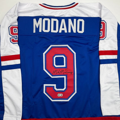 Autographed/Signed Mike Modano Team USA Blue Hockey Jersey Beckett BAS COA