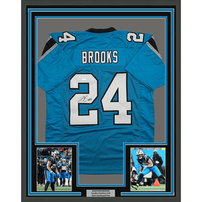 Framed Autographed/Signed Jonathon Brooks 35x39 Carolina Blue Football Jersey JSA COA