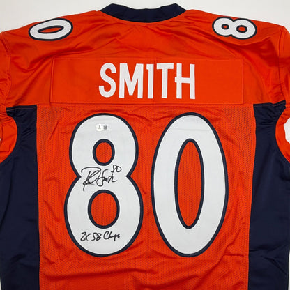 Autographed/Signed Rod Smith 2x SB Champs Denver Orange Pro Cut Football Jersey Beckett BAS COA