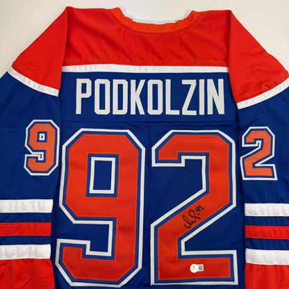 Autographed/Signed Vasily Podkolzin Edmonton Blue Hockey Jersey Beckett BAS COA