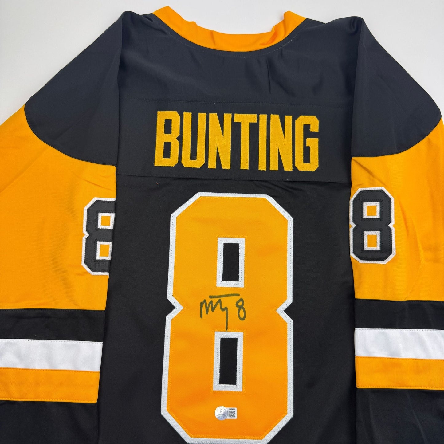 Autographed/Signed Michael Bunting Pittsburgh Black Hockey Jersey Beckett BAS COA