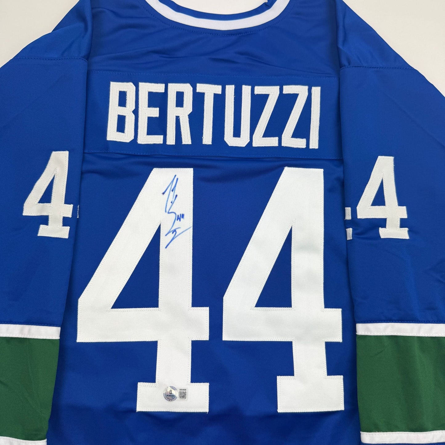 Autographed/Signed Todd Bertuzzi Vancouver Blue Hockey Jersey Beckett BAS COA