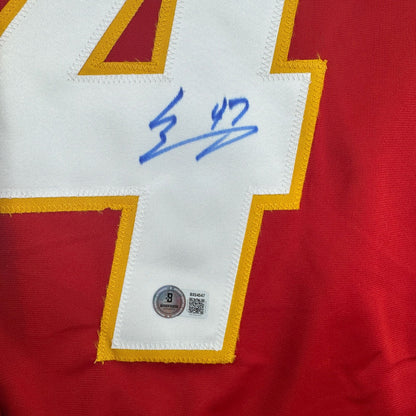 Autographed/Signed Connor Zary Calgary Red Hockey Jersey Beckett BAS COA