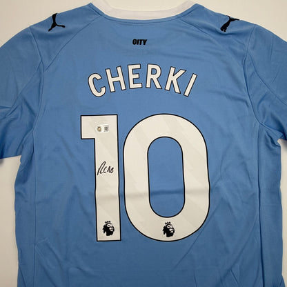 Autographed/Signed Rayan Cherki Manchester City Blue Soccer Futbol Jersey Beckett BAS COA