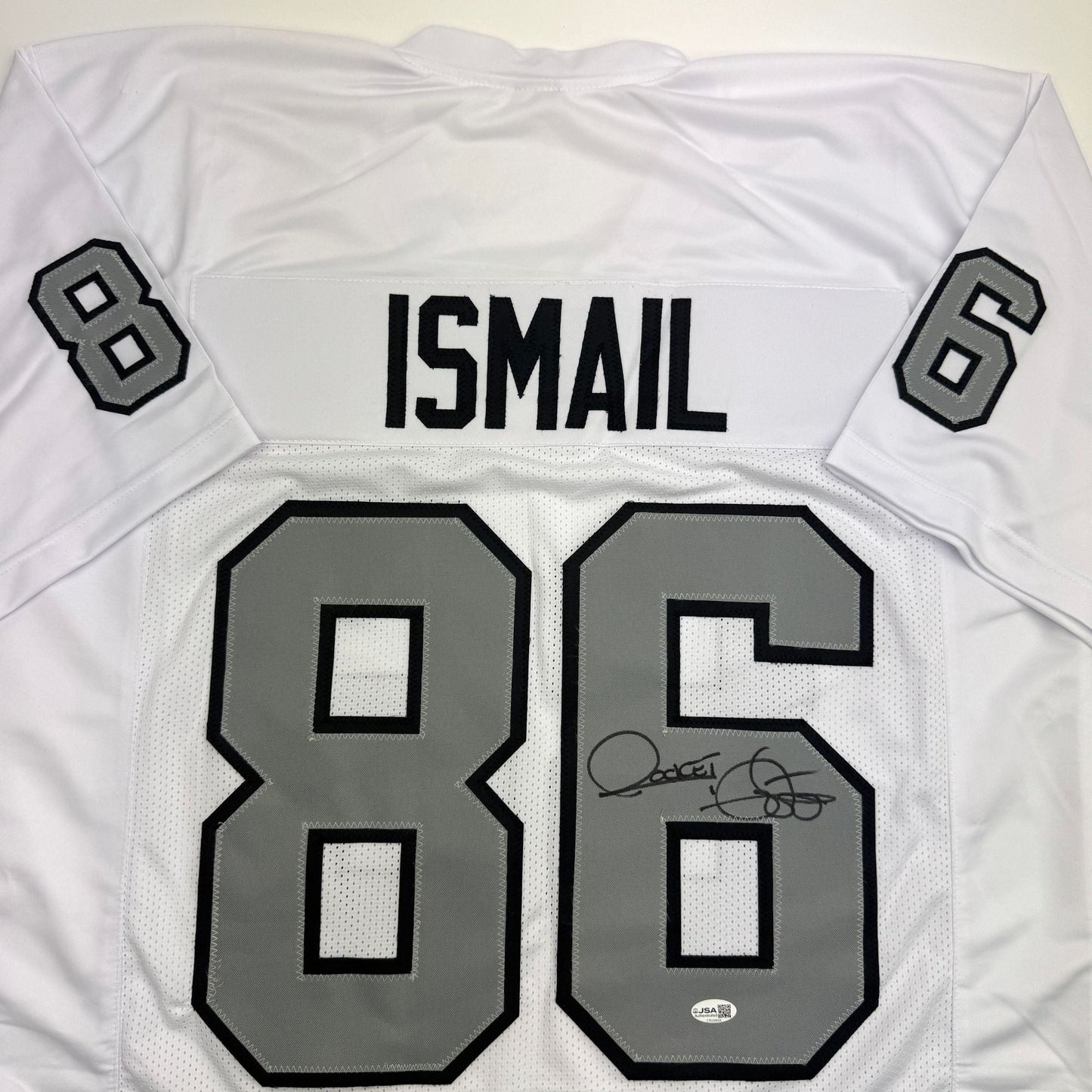 Autographed/Signed Raghib Ismail Rocket Oakland White Color Rush Football Jersey Beckett BAS COA