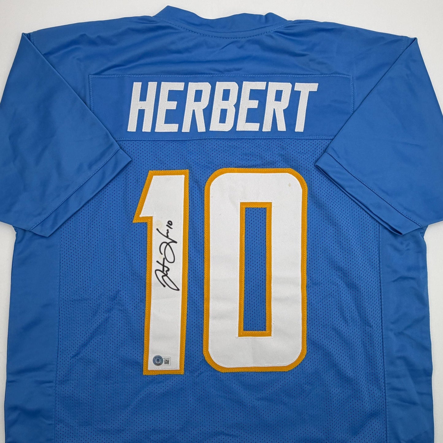 Autographed/Signed Justin Herbert Los Angeles San Diego Powder Blue Football Jersey Beckett BAS COA