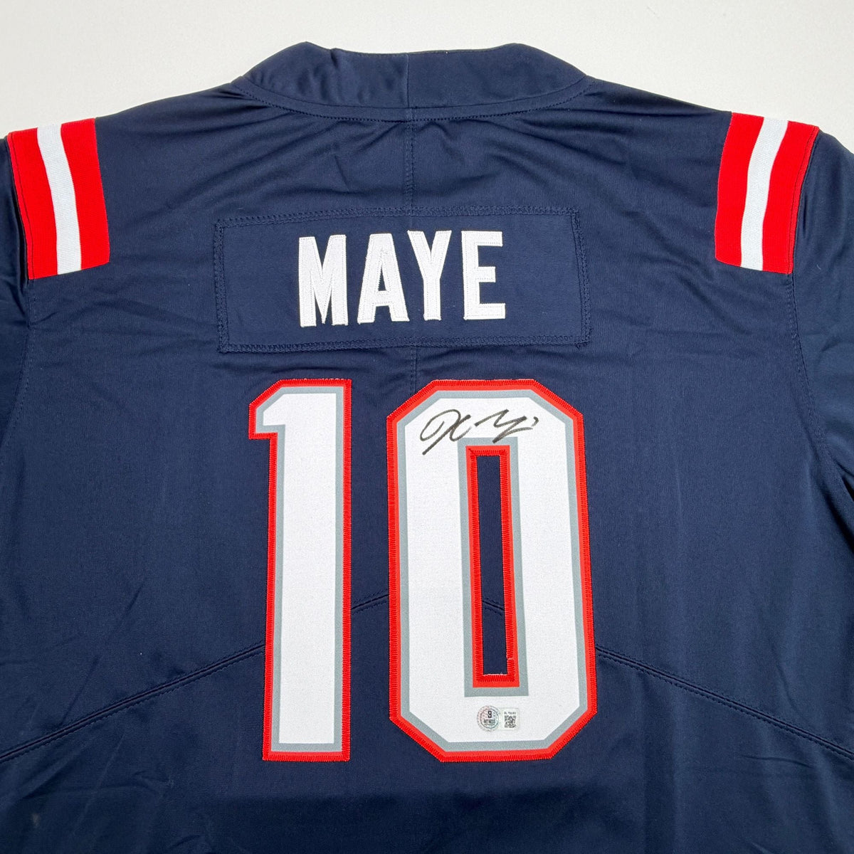 Autographed/Signed Drake Maye New England Patriots Blue Authentic Football Jersey Beckett BAS COA