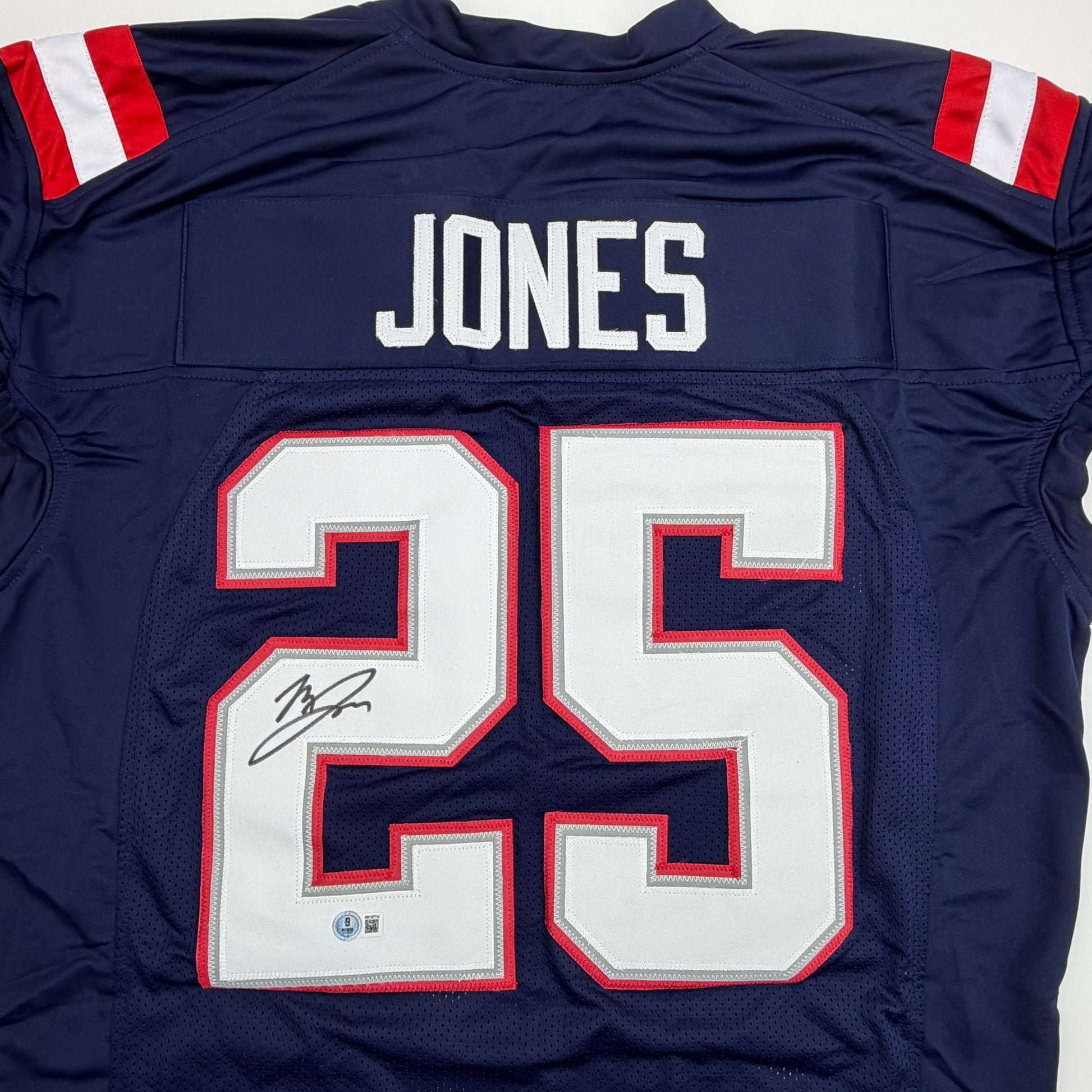 Autographed/Signed Marcus Jones New England Blue Pro Cut Football Jersey Beckett BAS COA