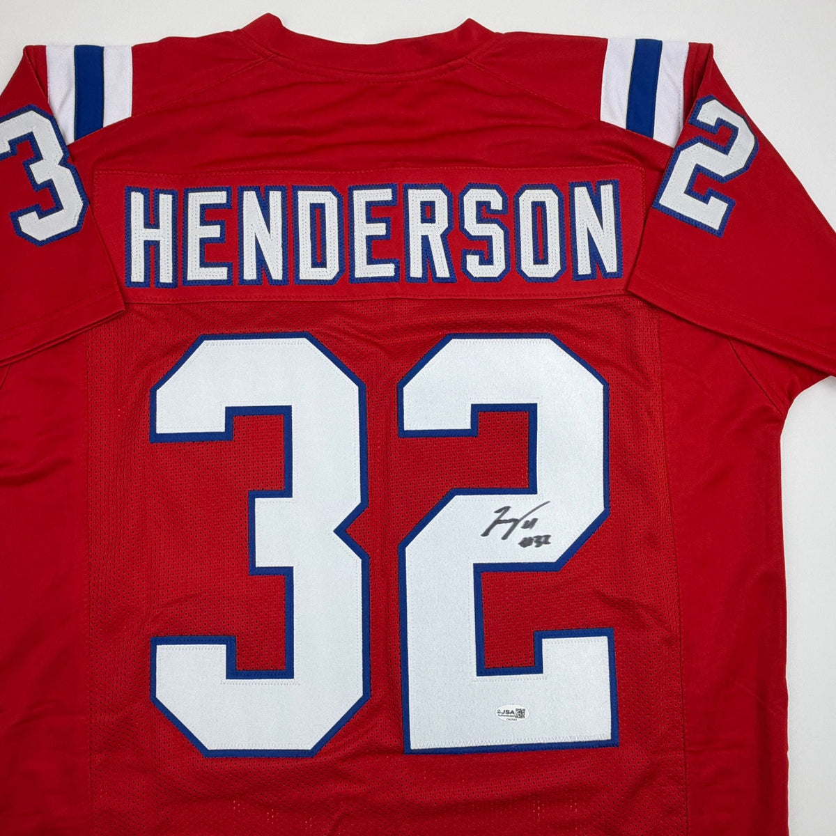 Autographed/Signed TreVeyon Henderson New England Red Football Jersey JSA COA