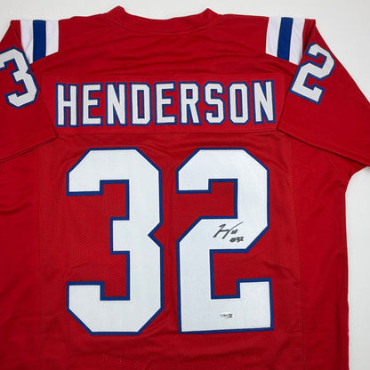 Autographed/Signed TreVeyon Henderson New England Red Football Jersey JSA COA