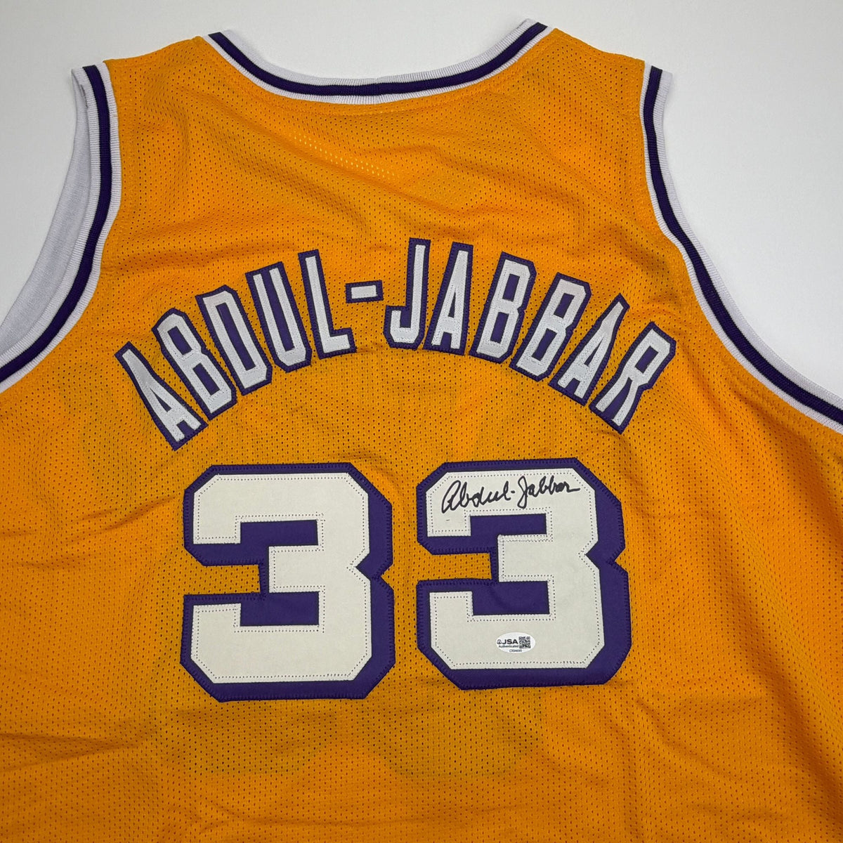 Autographed/Signed Kareem Abdul-Jabbar Los Angeles Yellow Basketball Jersey JSA COA