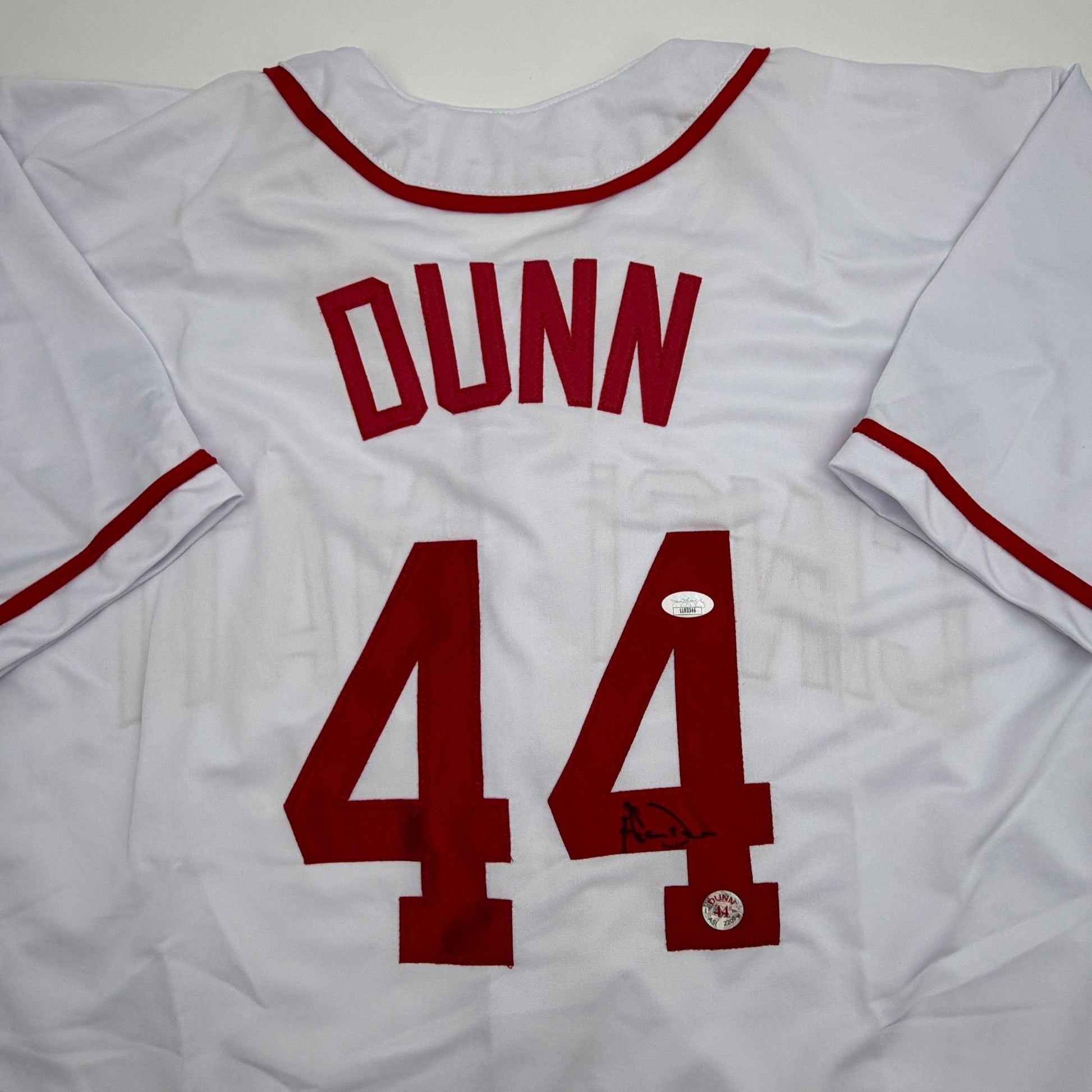 Autographed/Signed Adam Dunn Cincinnati White Baseball Jersey JSA COA