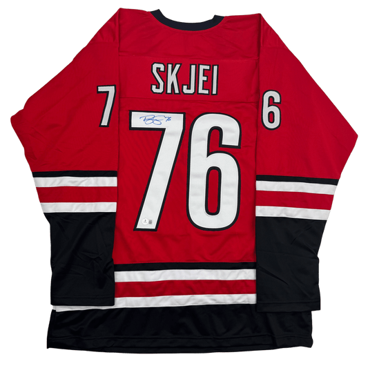 Autographed/Signed Brady Skjei Carolina Red Hockey Jersey Beckett BAS COA