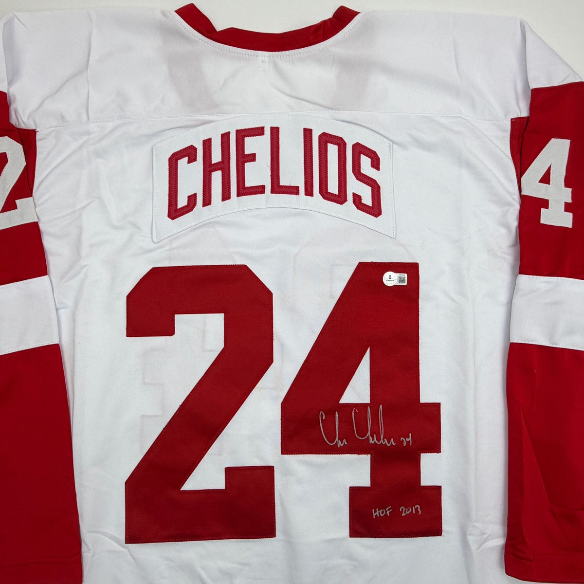 Autographed/Signed Chris Chelios Detroit White Hockey Jersey Beckett BAS COA