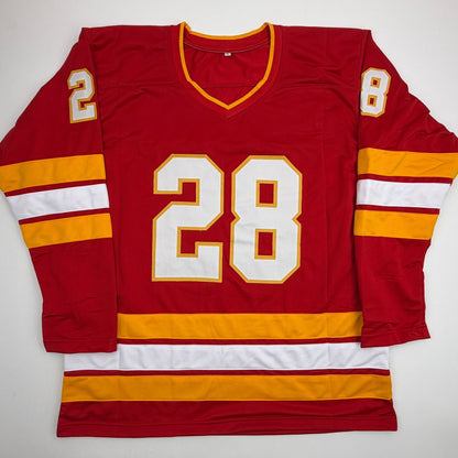 Autographed/Signed Elias Lindholm Calgary Red Hockey Jersey Beckett BAS COA