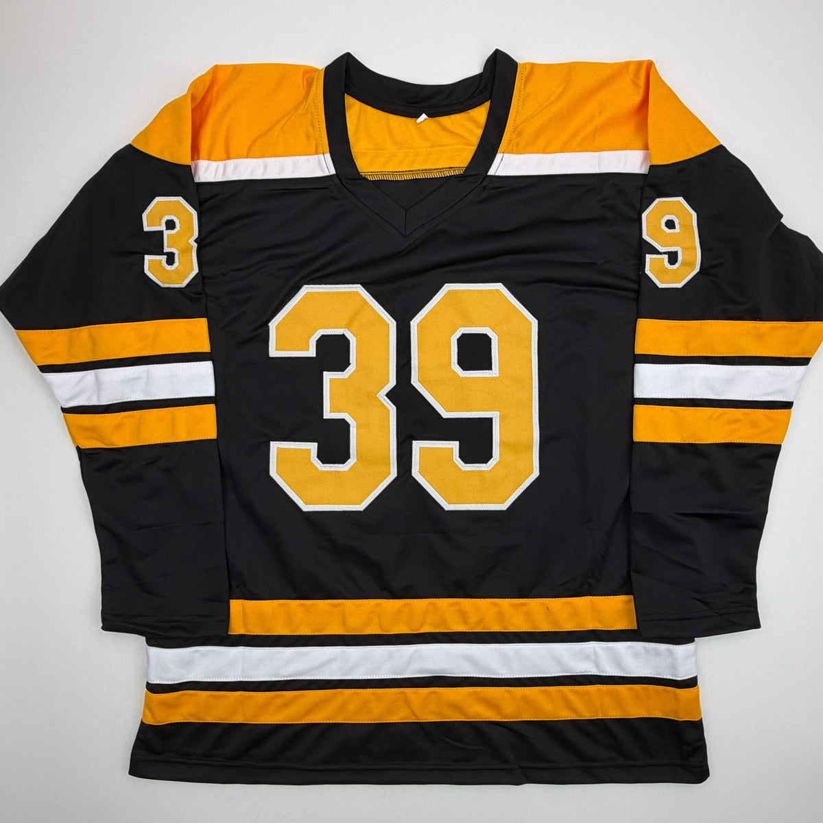 Autographed/Signed Morgan Geekie Boston Black Hockey Jersey Beckett BAS COA