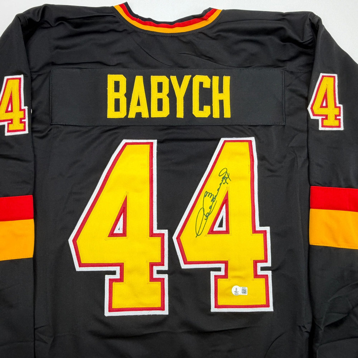 Autographed/Signed Dave Babych Vancouver Black Hockey Jersey Beckett BAS COA