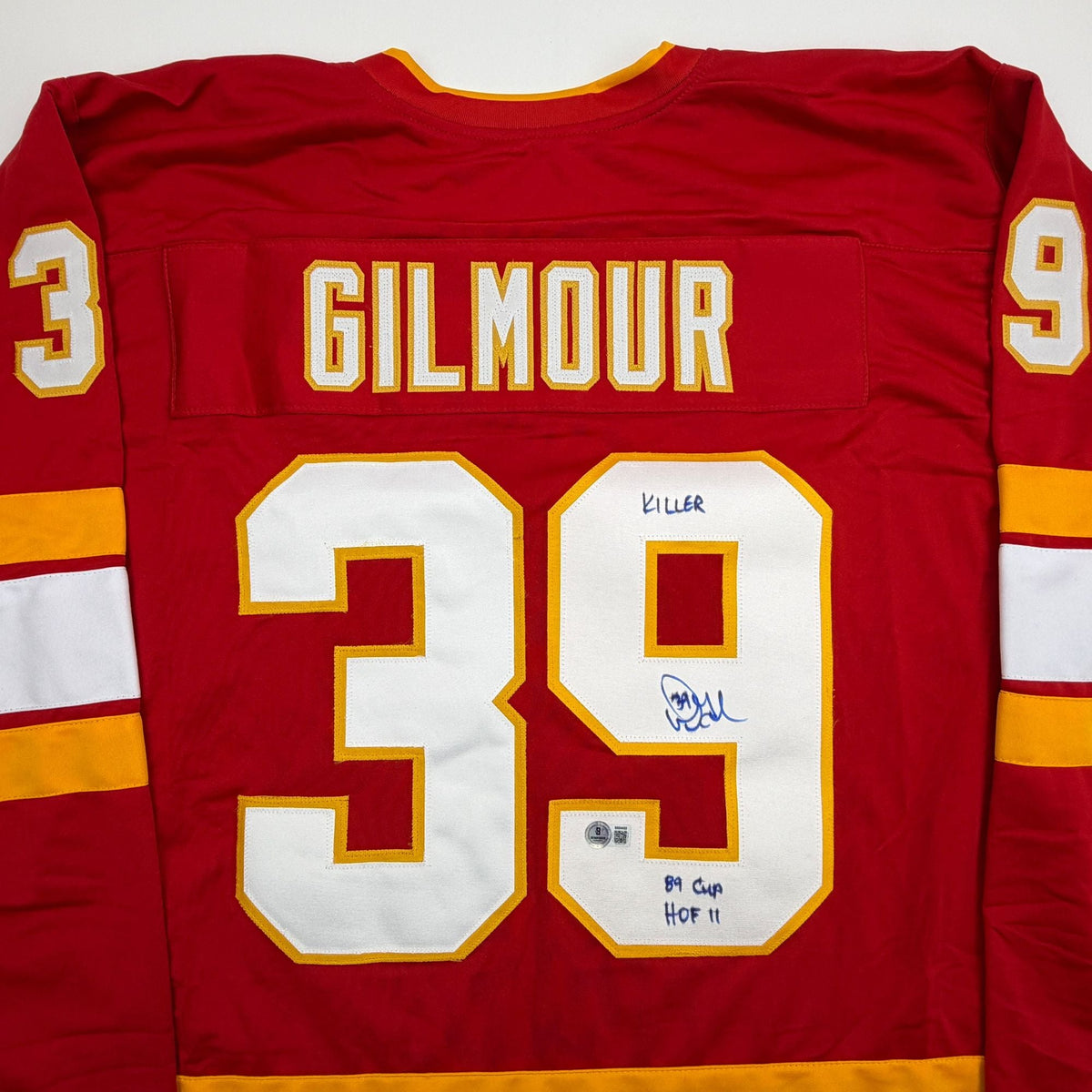 Autographed/Signed Doug Gilmour Calgary Red Hockey Jersey Beckett BAS COA