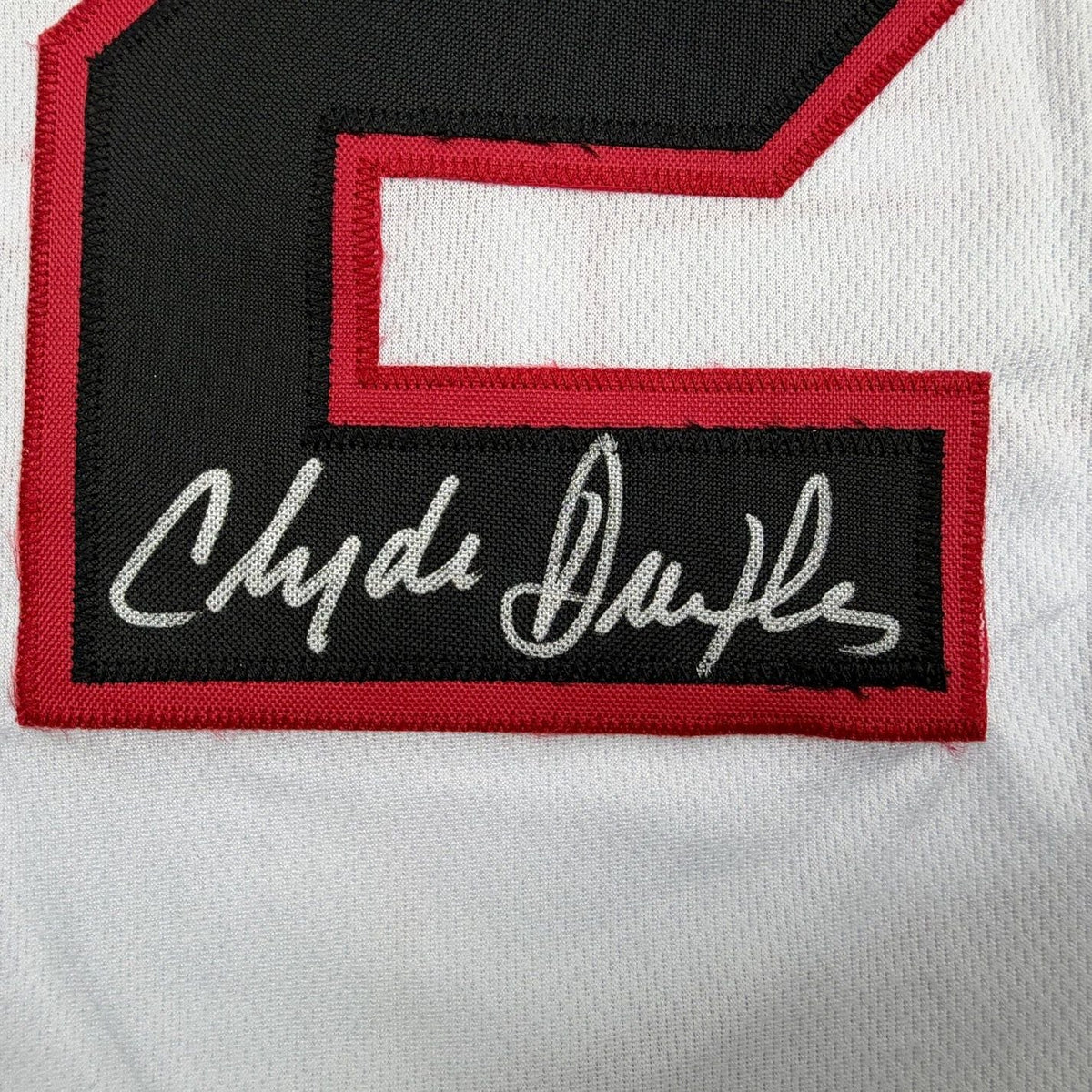 Framed Autographed/Signed Clyde Drexler 35x39 Portland White Basketball Jersey JSA COA