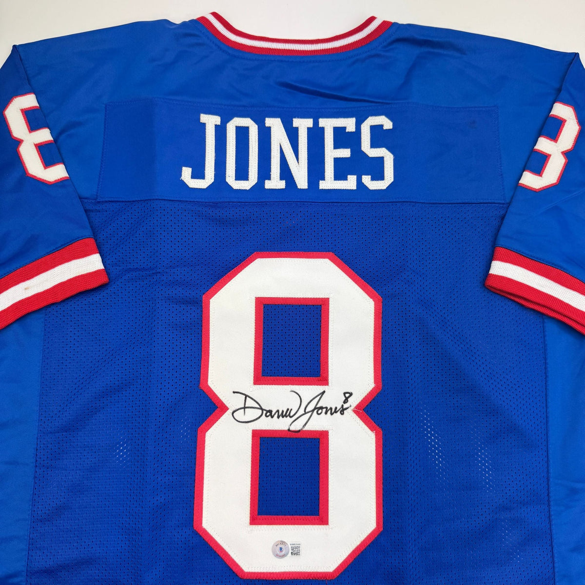 Autographed/Signed Daniel Jones New York Blue Retro Football Jersey Beckett BAS COA