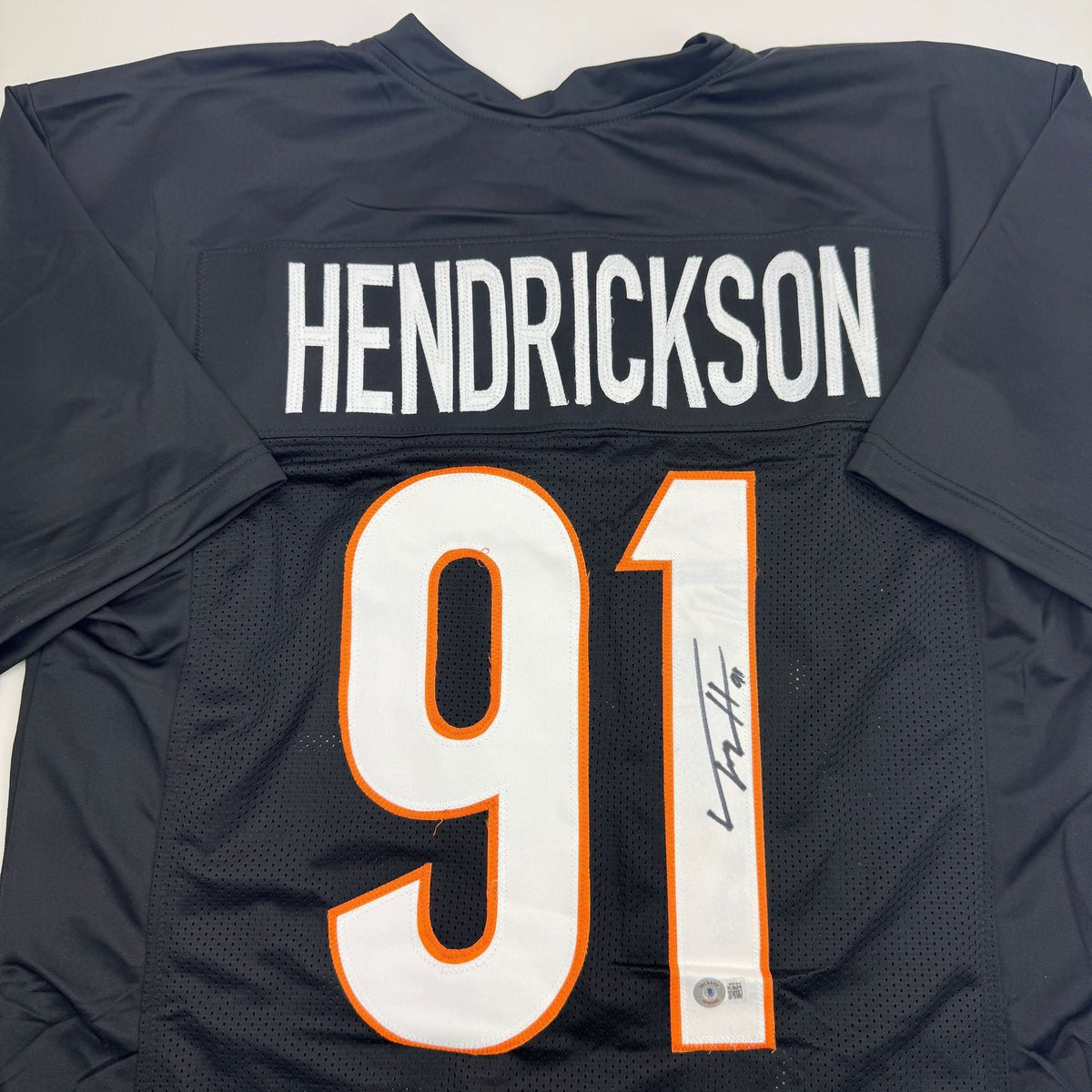 Autographed/Signed Trey Hendrickson Cincinnati Black Football Jersey Beckett BAS COA