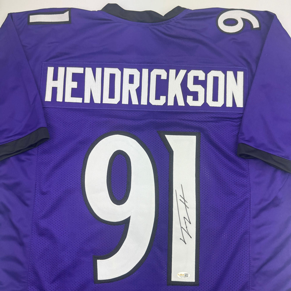 Autographed/Signed Trey Hendrickson Baltimore Purple Football Jersey Beckett BAS COA