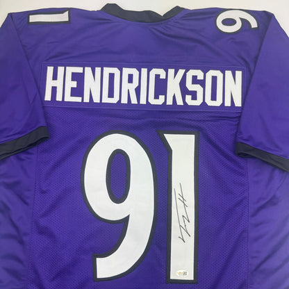 Autographed/Signed Trey Hendrickson Baltimore Purple Football Jersey Beckett BAS COA