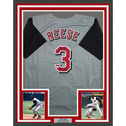 Framed Autographed/Signed Pokey Reese 35x39 Cincinnati Grey Baseball Jersey Beckett BAS COA