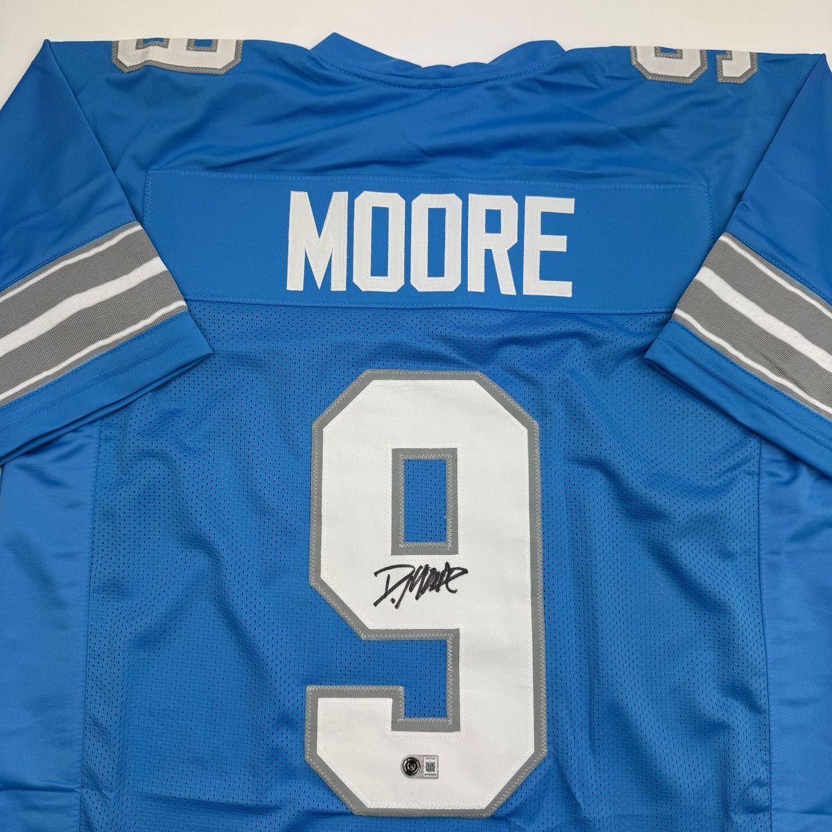 Autographed/Signed Derrick Moore Detroit Blue Football Jersey Beckett BAS COA