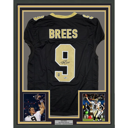 Framed Autographed/Signed Drew Brees 35x39 New Orleans Black Pro Cut Football Jersey Beckett BAS COA