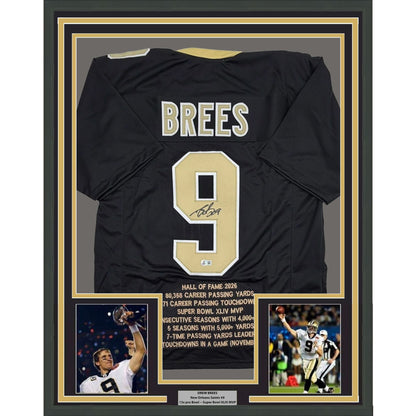 Framed Autographed/Signed Drew Brees 35x39 New Orleans Black Stat Football Jersey Beckett BAS COA