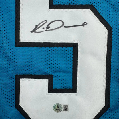 Framed Autographed/Signed Rico Dowdle 35x39 Carolina Blue Football Jersey Beckett BAS COA