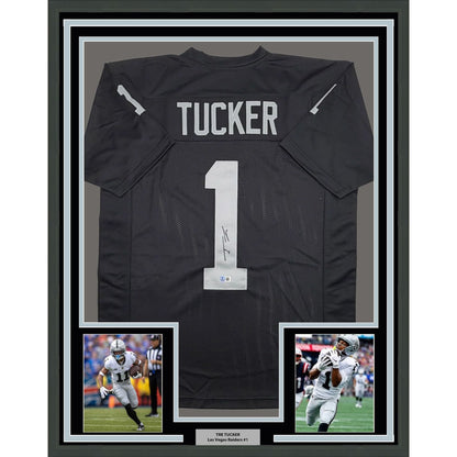 Framed Autographed/Signed Tre Tucker 35x39 Oakland Las Vegas Black Football Jersey Beckett BAS COA