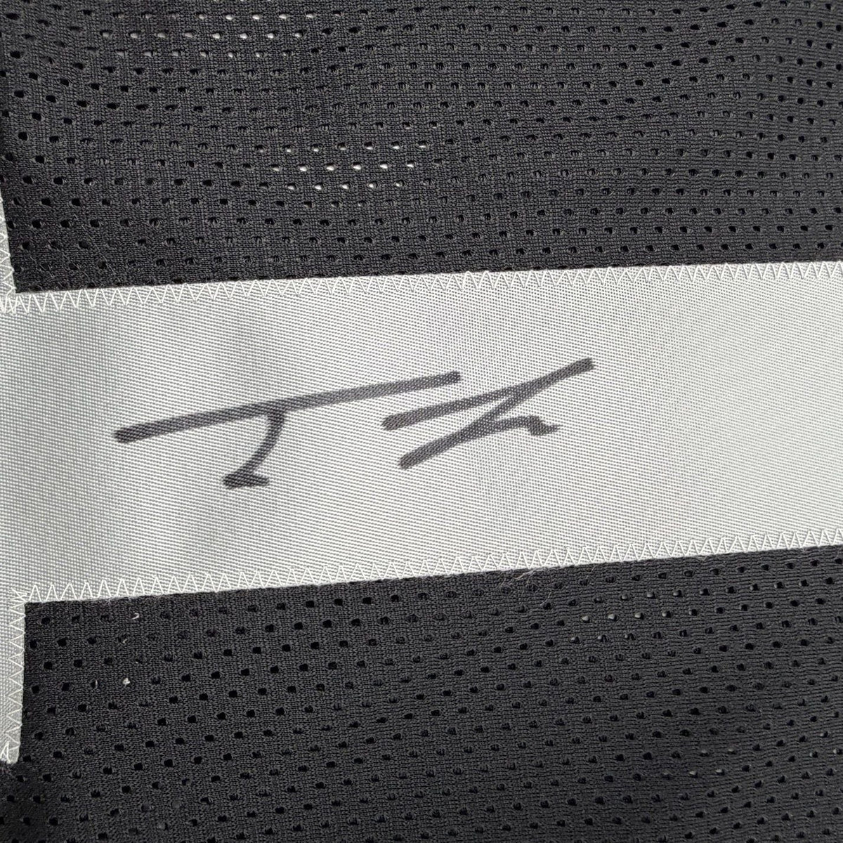 Framed Autographed/Signed Tre Tucker 35x39 Oakland Las Vegas Black Football Jersey Beckett BAS COA