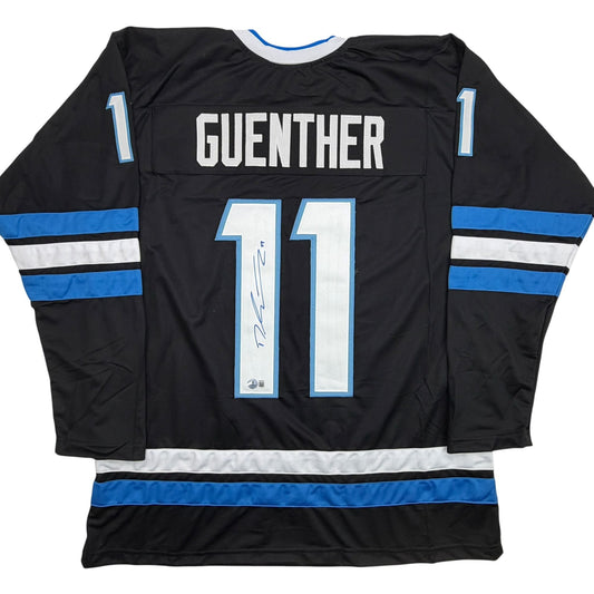 Autographed/Signed Dylan Guenther Utah Black Hockey Jersey Beckett BAS COA