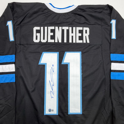 Autographed/Signed Dylan Guenther Utah Black Hockey Jersey Beckett BAS COA