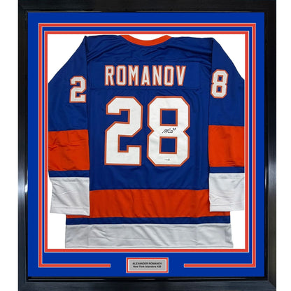 Framed Autographed/Signed Alexander Romanov 35x39 New York Blue Hockey Jersey JSA COA