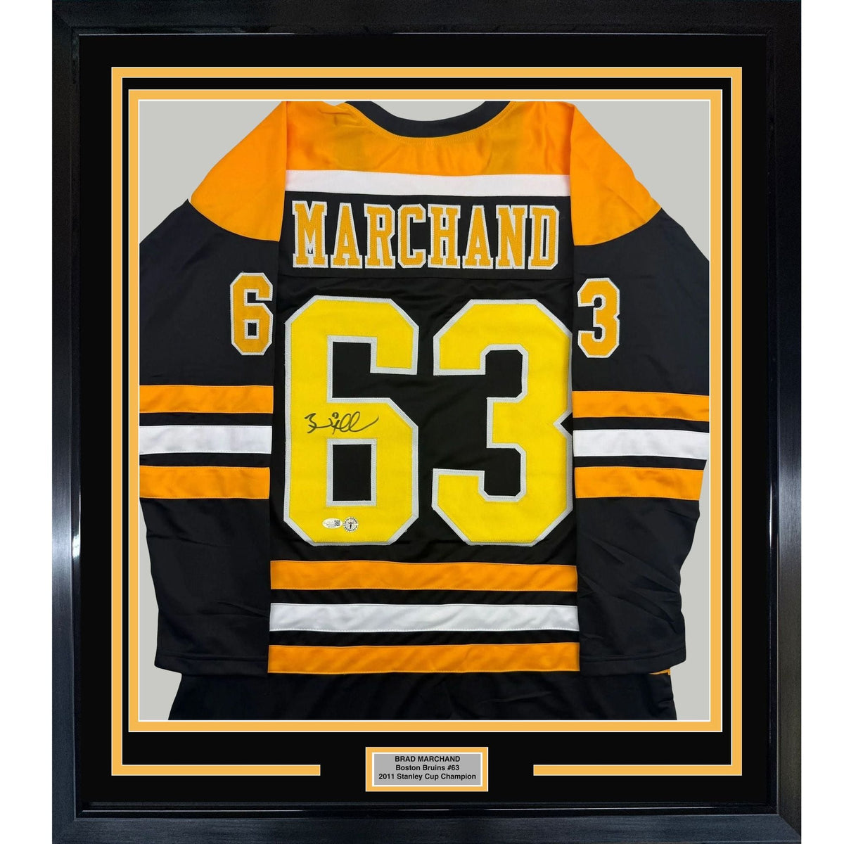 Framed Autographed/Signed Brad Marchand 35x39 Boston Black Hockey Jersey JSA COA